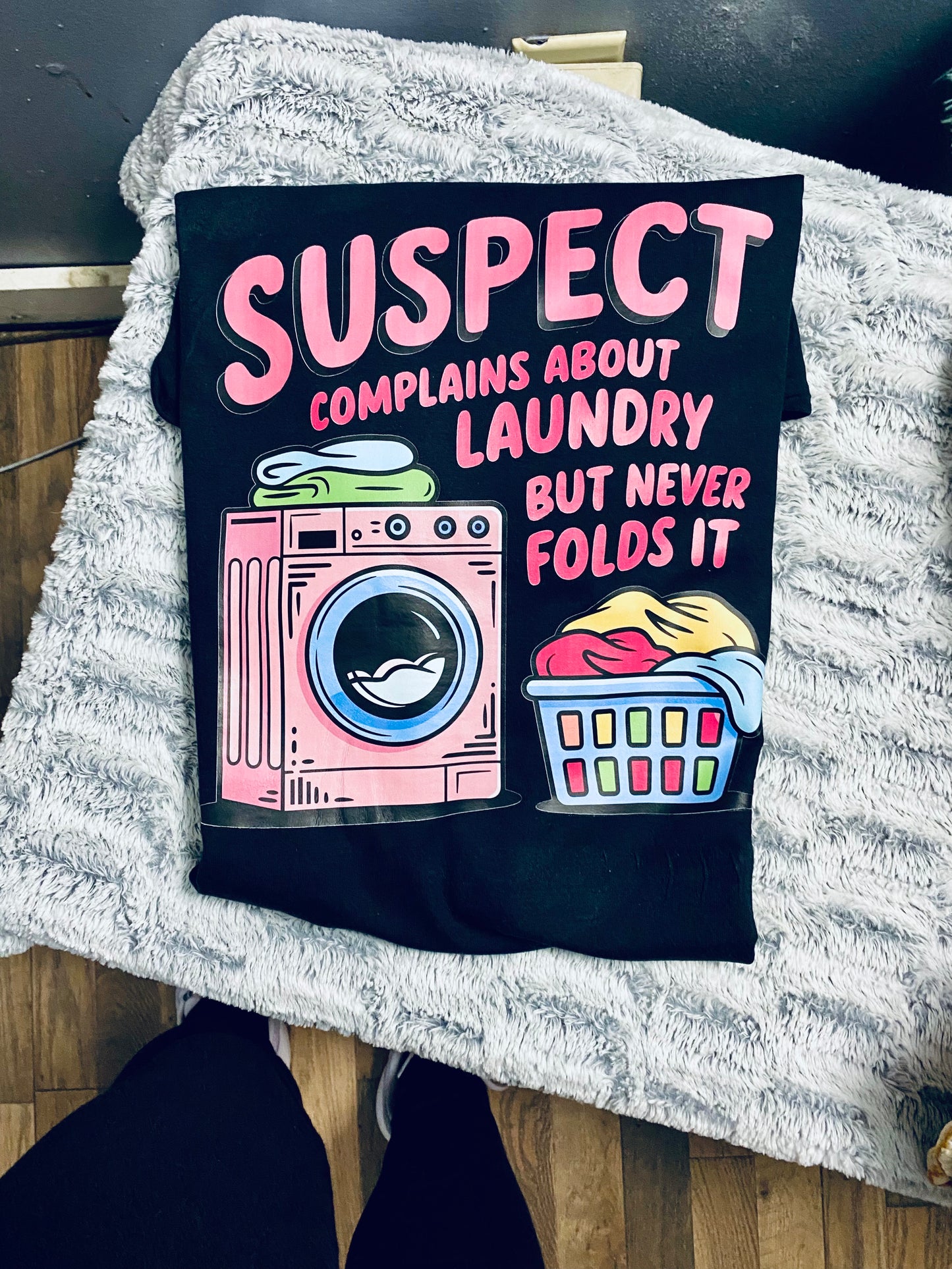 Suspect Complains About Laundry But Never Folds It CC Tee