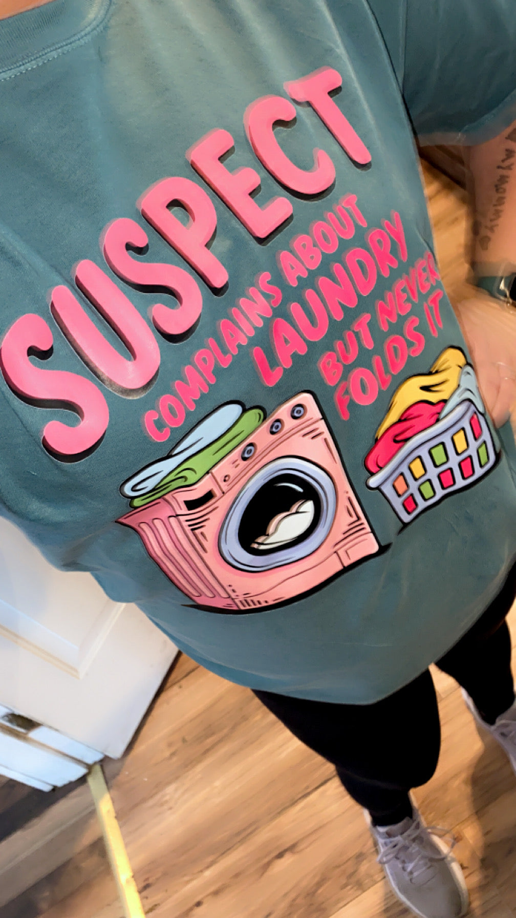 Suspect Complains About Laundry But Never Folds It CC Tee